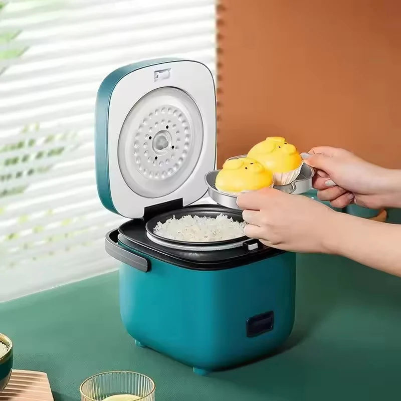 Mini cuiseur à riz ouvert avec plateau vapeur